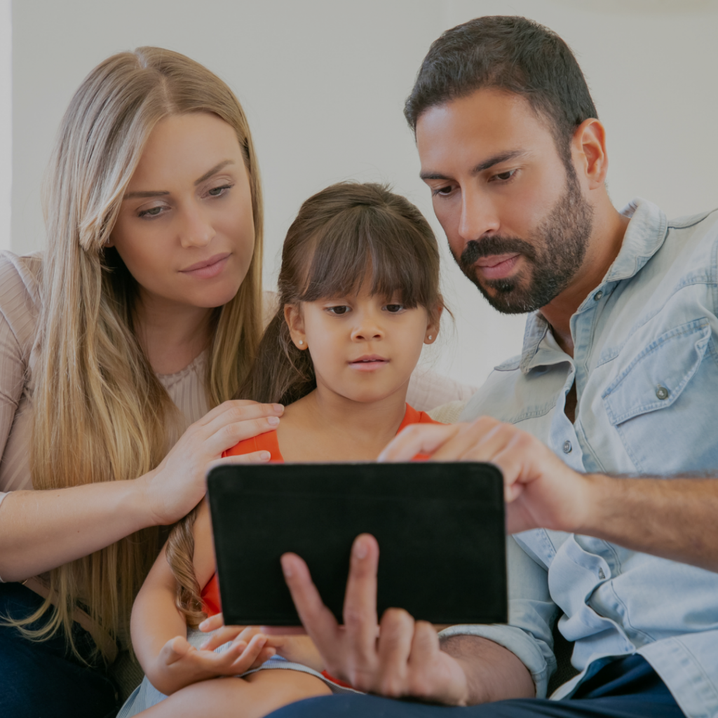 family watching a tablet
